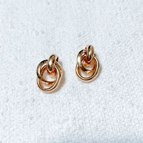 Anthropologie Jewelry - Minimalist twist hoop stud earrings M230